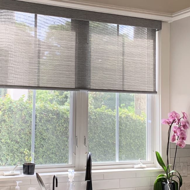 roller shades above kitchen sink in Baybrook TX