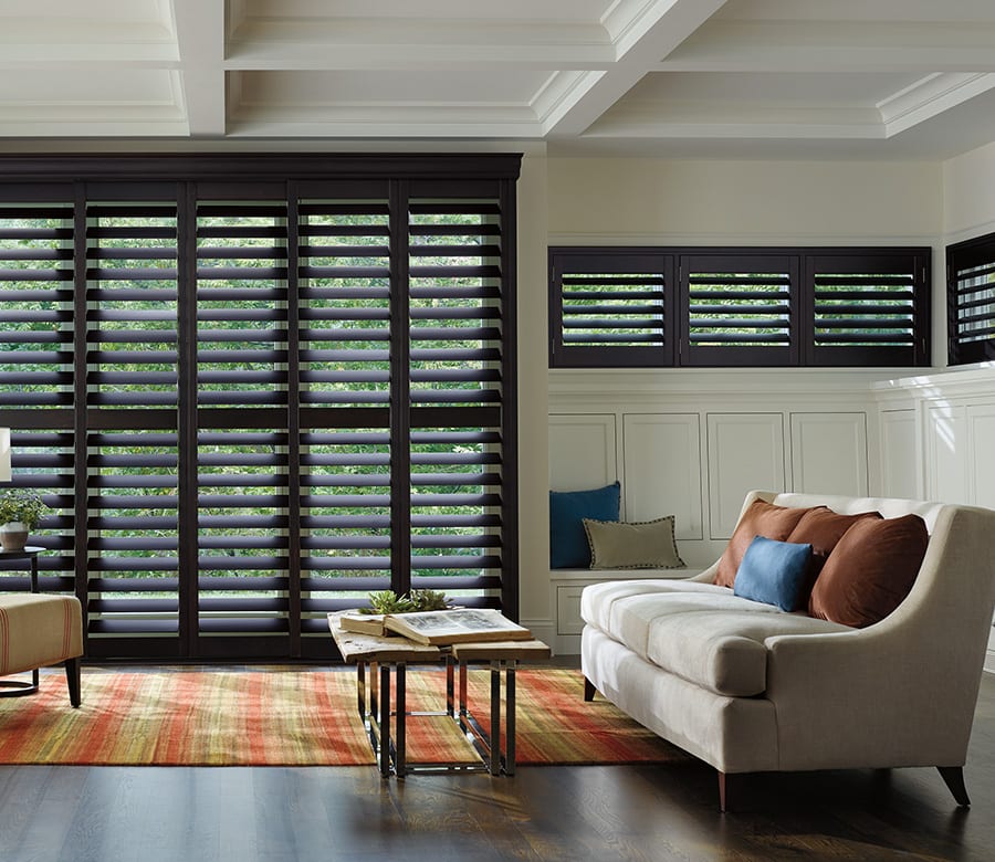 living room large window hardwood shutters Houston TX