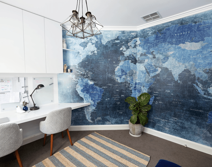 world map mural in blue color of the year 2020