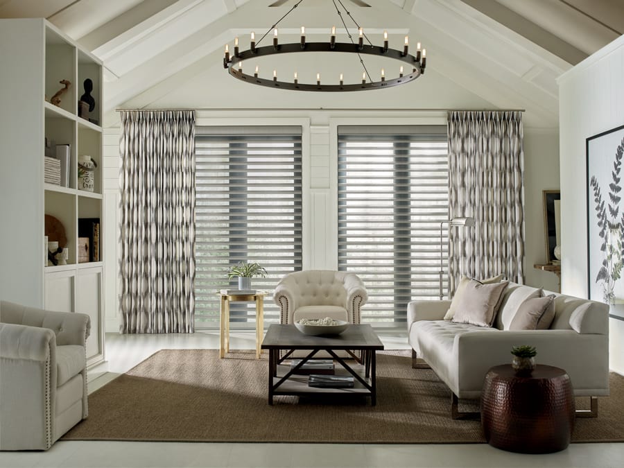 custom window treatments motorized drapery panels in Houston living room