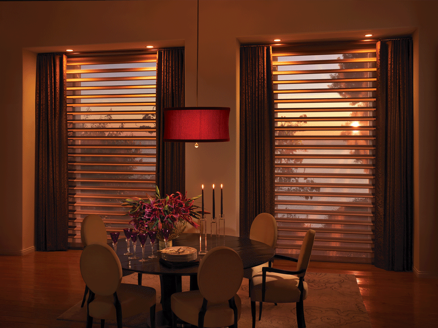 dining room with pirouette shades creating atmosphere with light filtering sheer fabrics Woodlands, TX