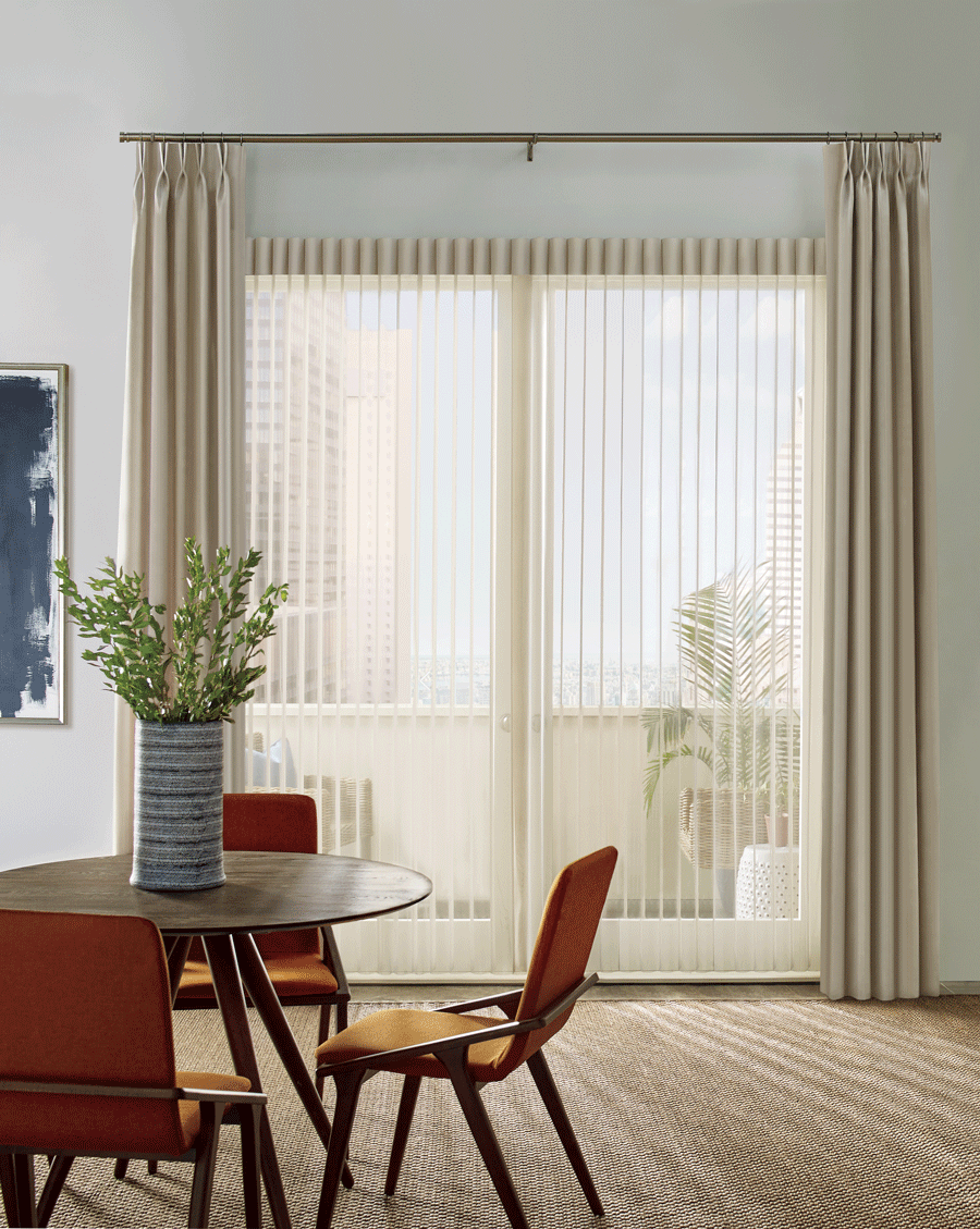 sheer shades in living room over sliding glass door Houston