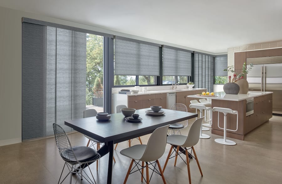 Modern kitchen with Stormy Gray roller shades.