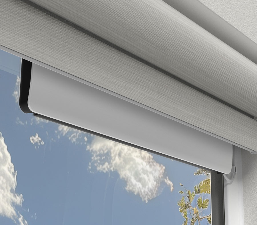 solar charger for rechargeable batteries of motorized shades attached inside window