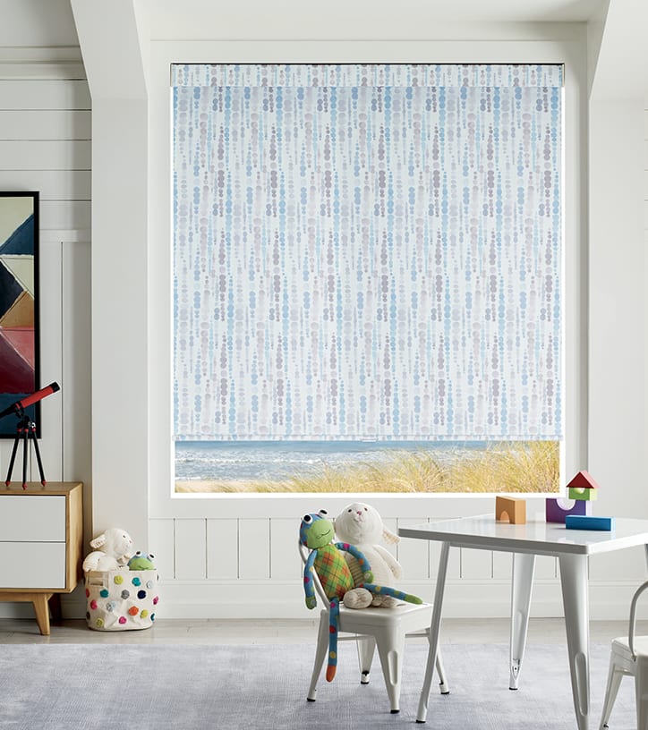 blue patterned cordless roman shades as child safe blinds in Houston playroom