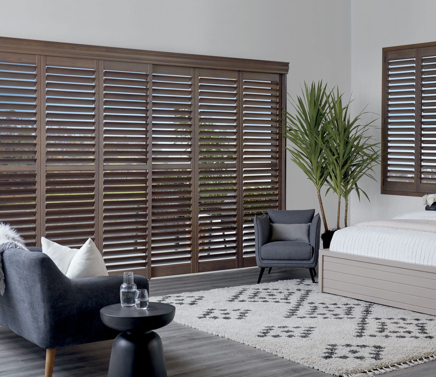 master bedroom tilted view of newstyle hybrid shutters houston texas