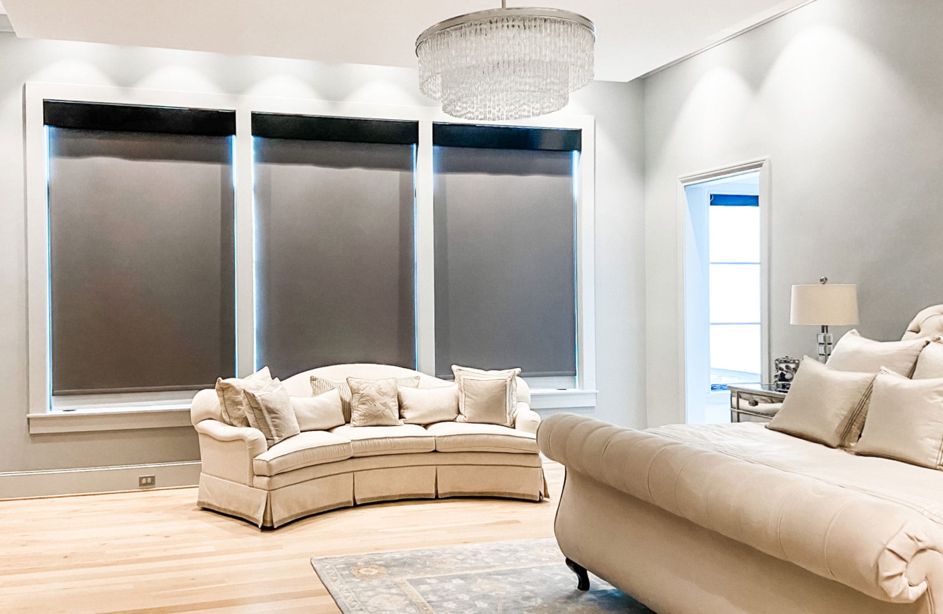 living room with black roller shades in Houston TX