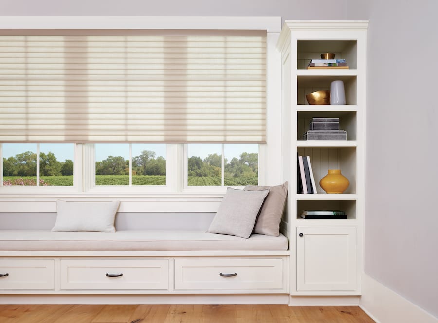 cellular shades window seat in Houston, TX for energy efficient window treatments