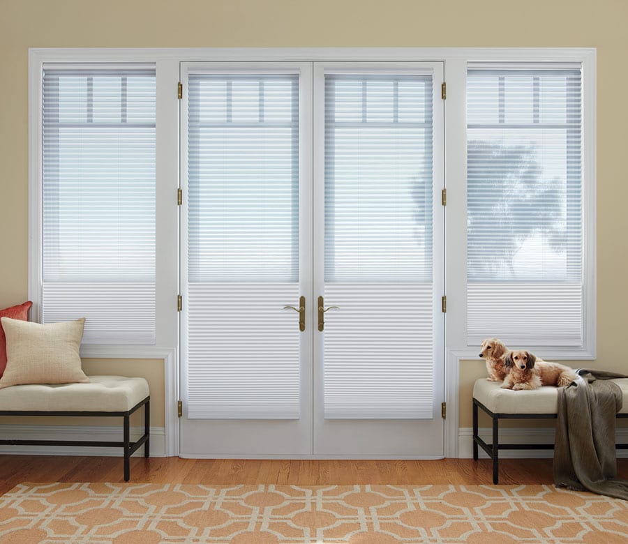 french door entryway with white cellular shades in Rice Village TX