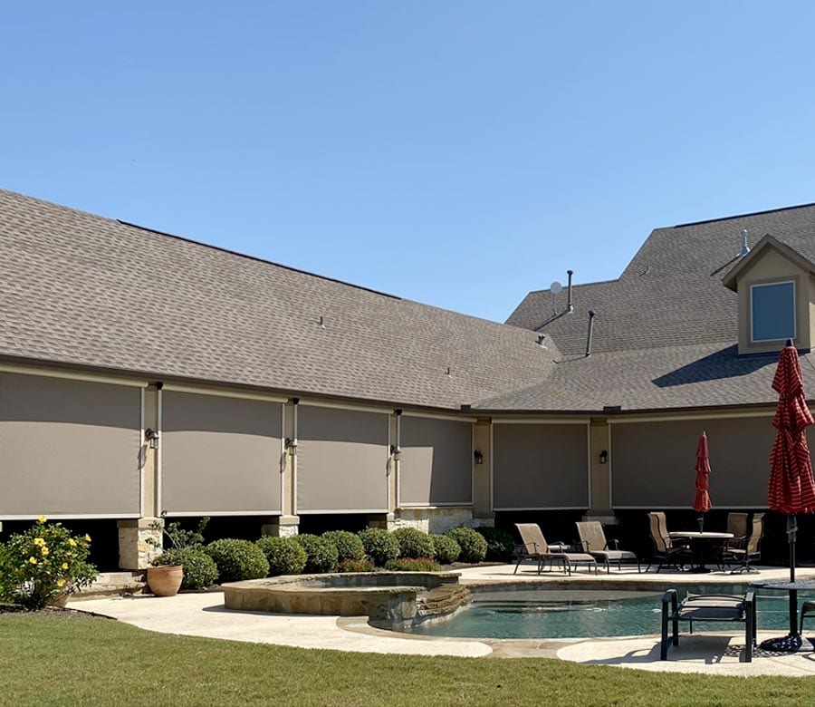 opaque patio shades to block light on multi-section patio in the Woodlands in Houston TX