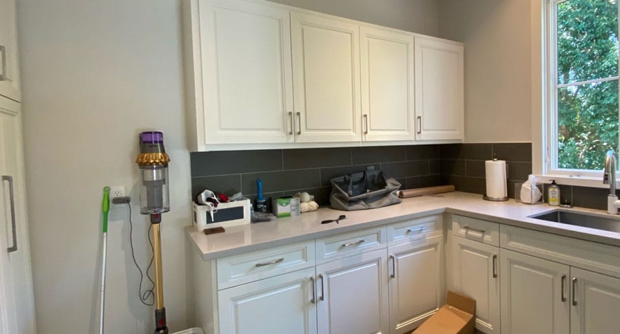 white kitchen before adding wall coverings in Friendswood, TX