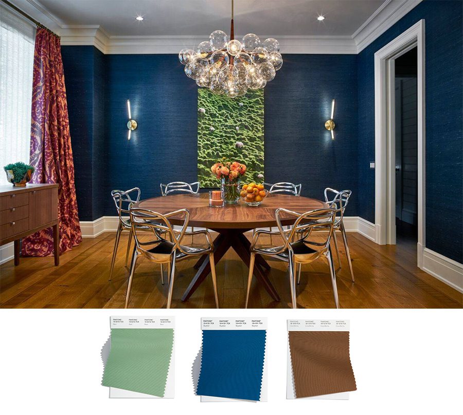 deep blue grasscloth wallcovering in dining room with wood floors