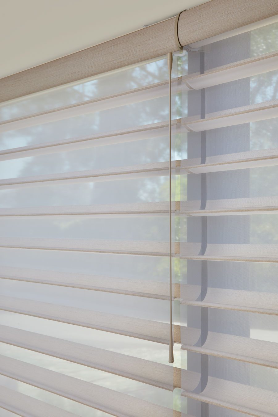 close up of silhouette shades and soft touch wand motorization in Houston TX