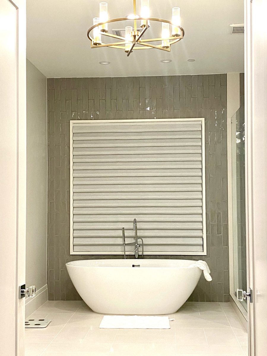 bathroom features of privacy over standing tub in Baybrook TX