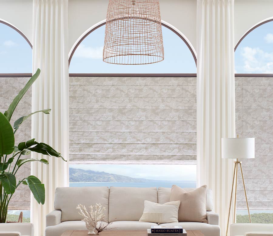 floor to ceiling arched windows in modern neutral living room Magnolia, TX