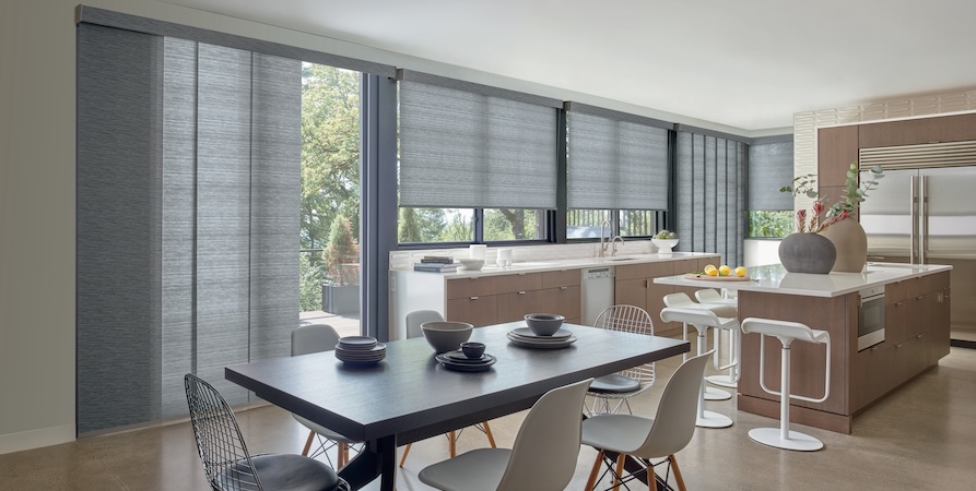 coordinating vertical shades and roller shades creating a cohesive whole home look