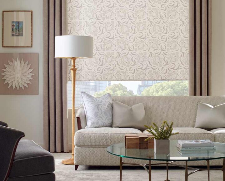 beige and cream living room with brown drapery and beige couch west u rice, tx