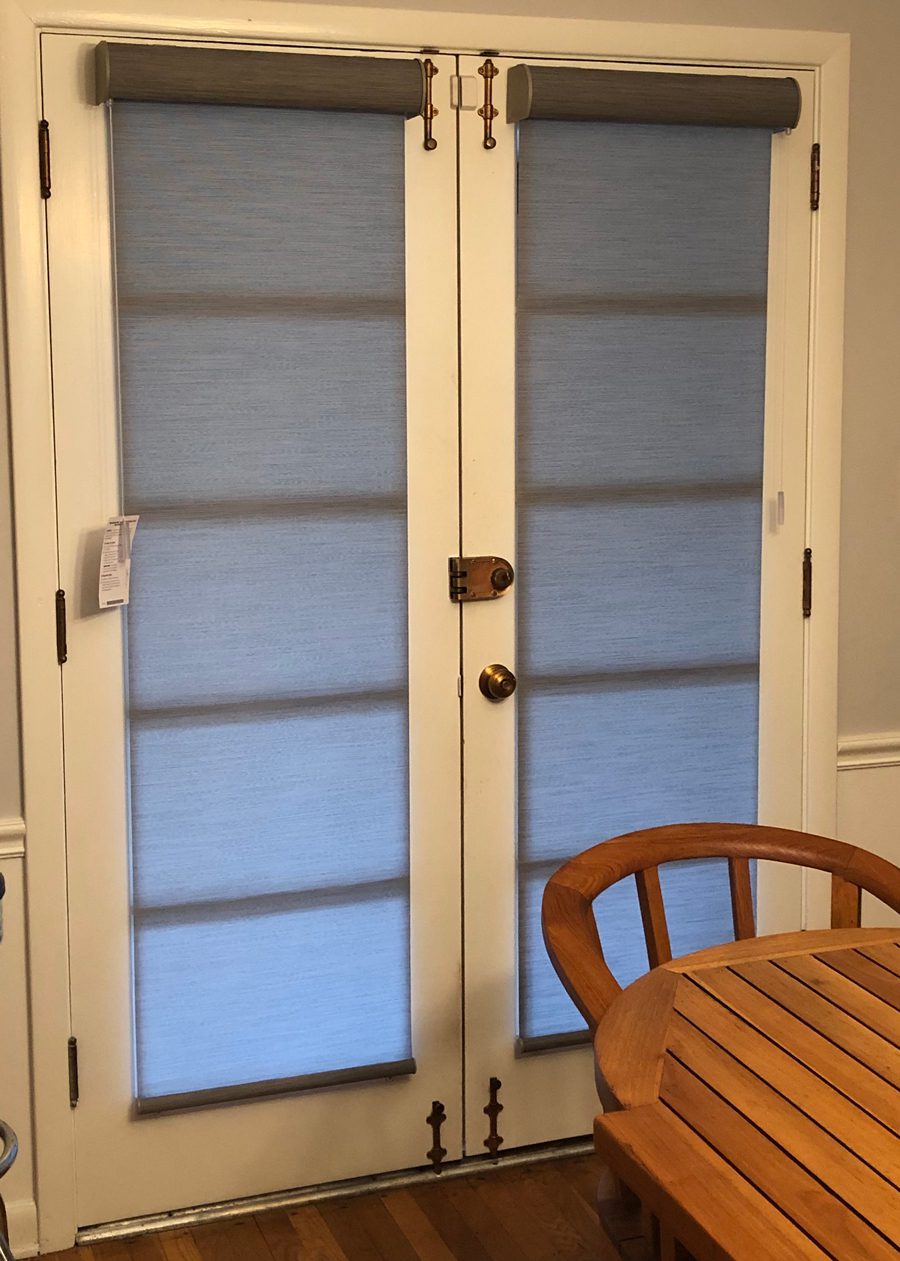 interior french doors covered with roller shades