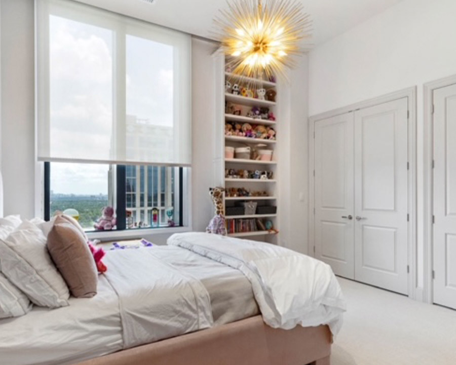 girls bedroom in Houston, TX condo with Hunter Douglas screen shades