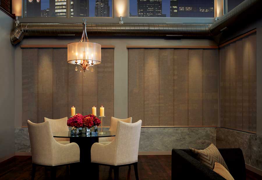 panel track blinds in elegant dining room