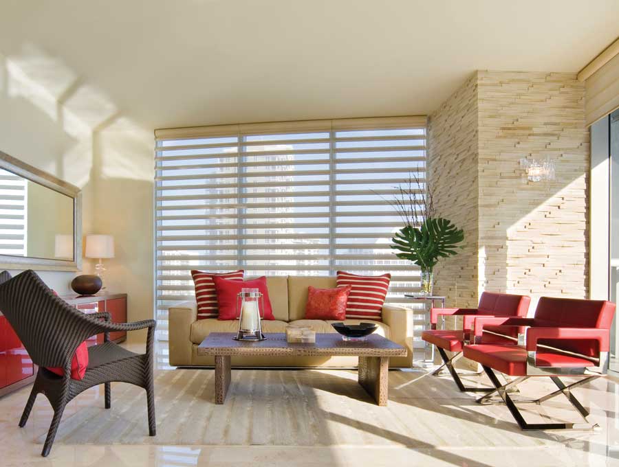 living room with red accents in chairs and pillows in Houston TX