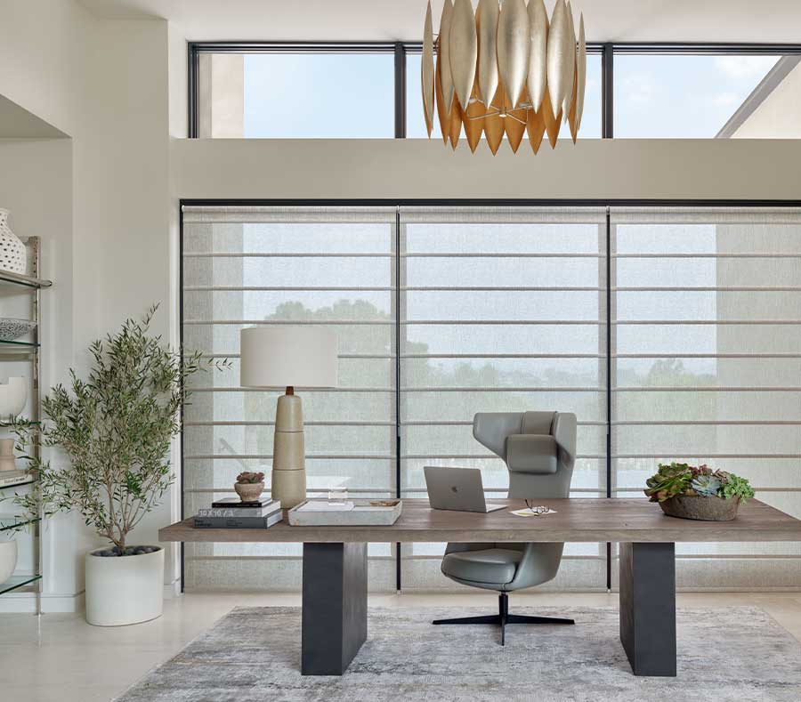 modern executive office with floor to ceiling windows, covered with Architectural Roller Shades in Houston TX