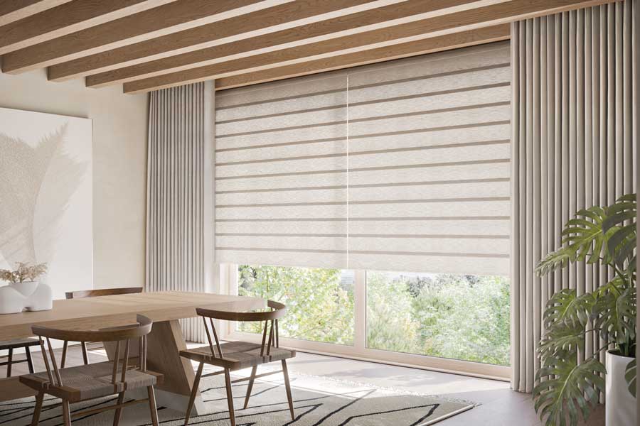 beige draperies on beige roman shades for large window coverings in Houston home