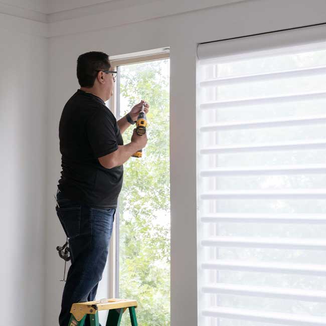 window treatment installer working in houston home
