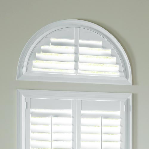 arched window with white shutters