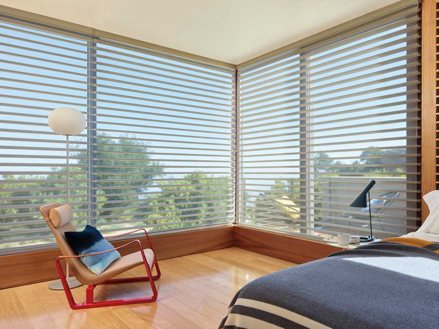 bedroom with corner windows