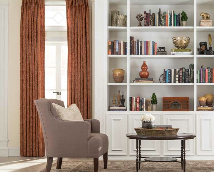burnt orange drapes in Houston home library