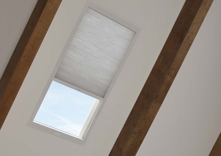 skylight shades on vaulted ceiling in Houston home