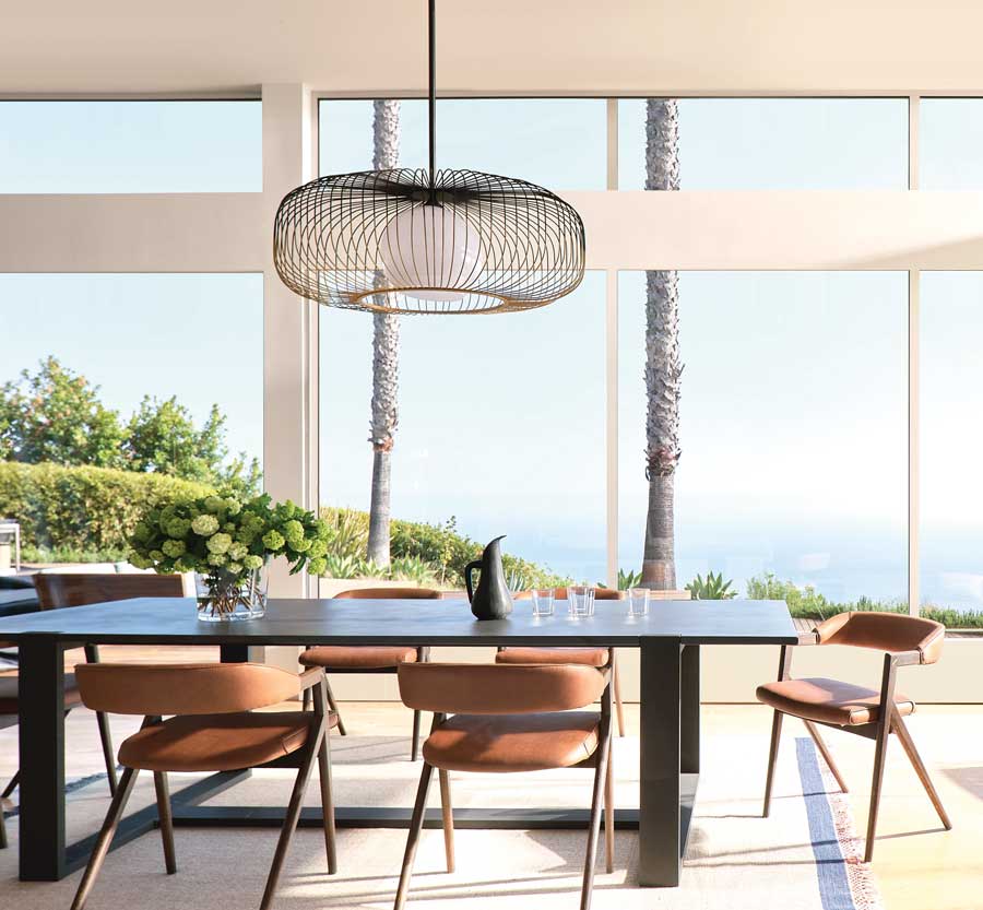 dining area with large bare windows