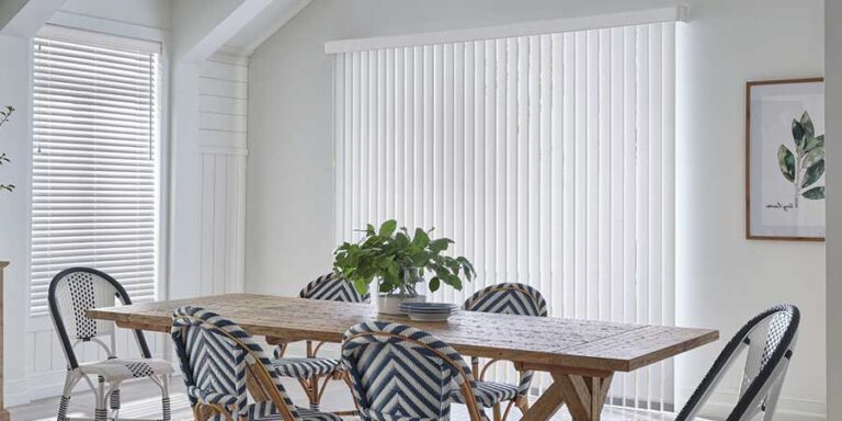 dining room table with white vertical shades
