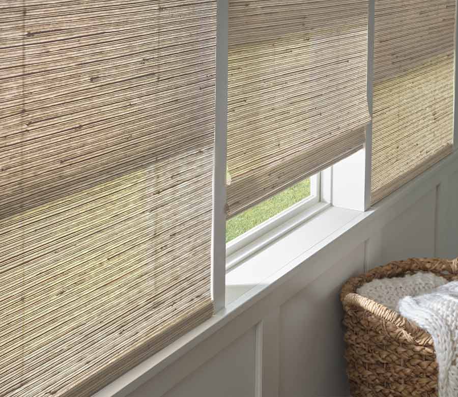 Bedroom with neutral provenance woven blinds