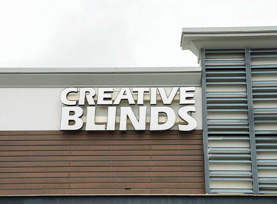 creative blinds outside sign at showroom