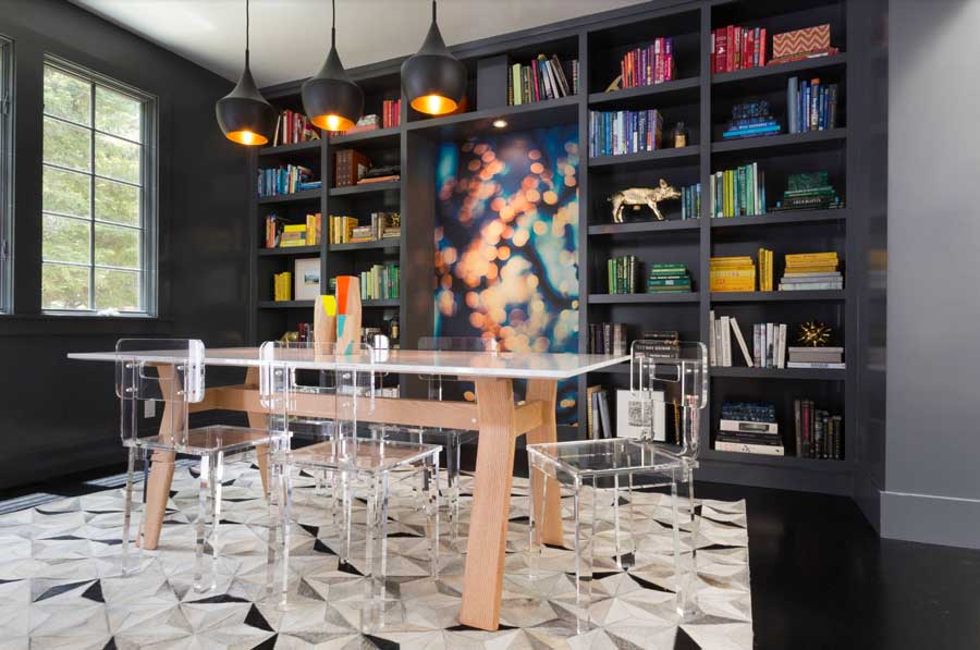 dining room with black built in shelves and pop of all the pantone 2026 colors
