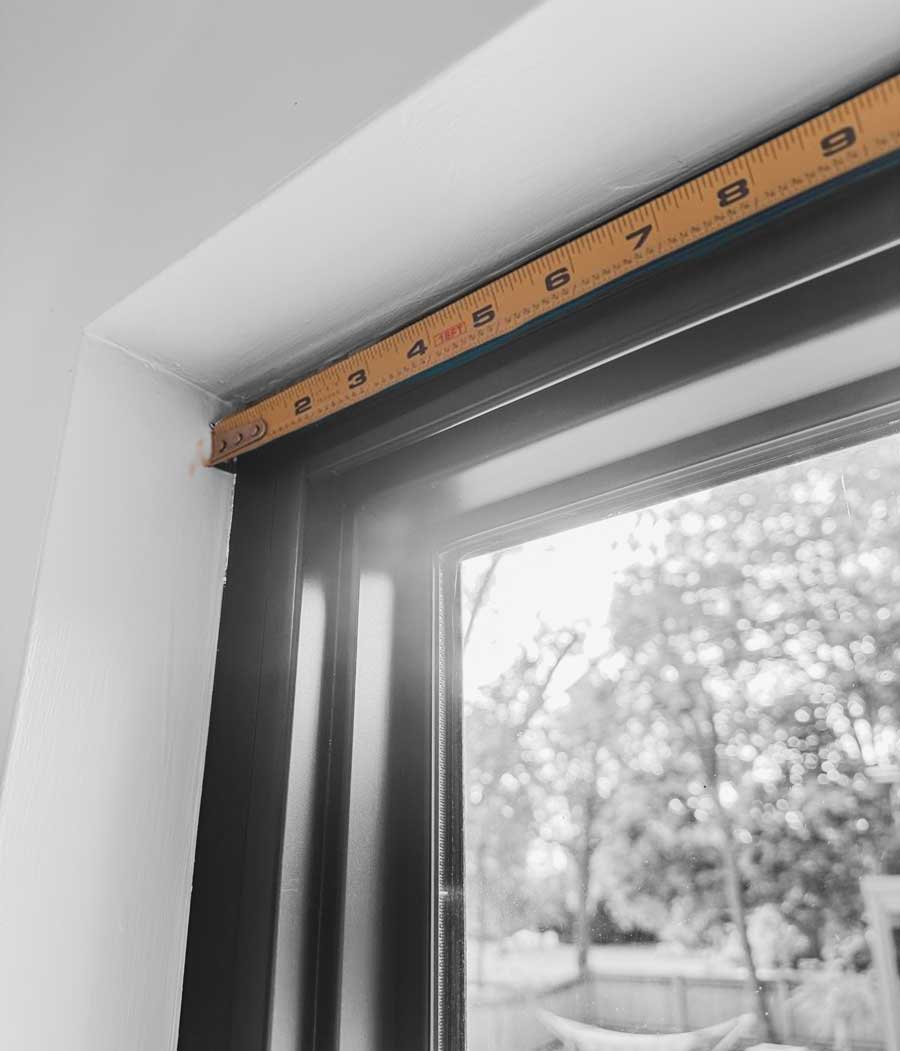 tape measure on top of window common window covering mistakes