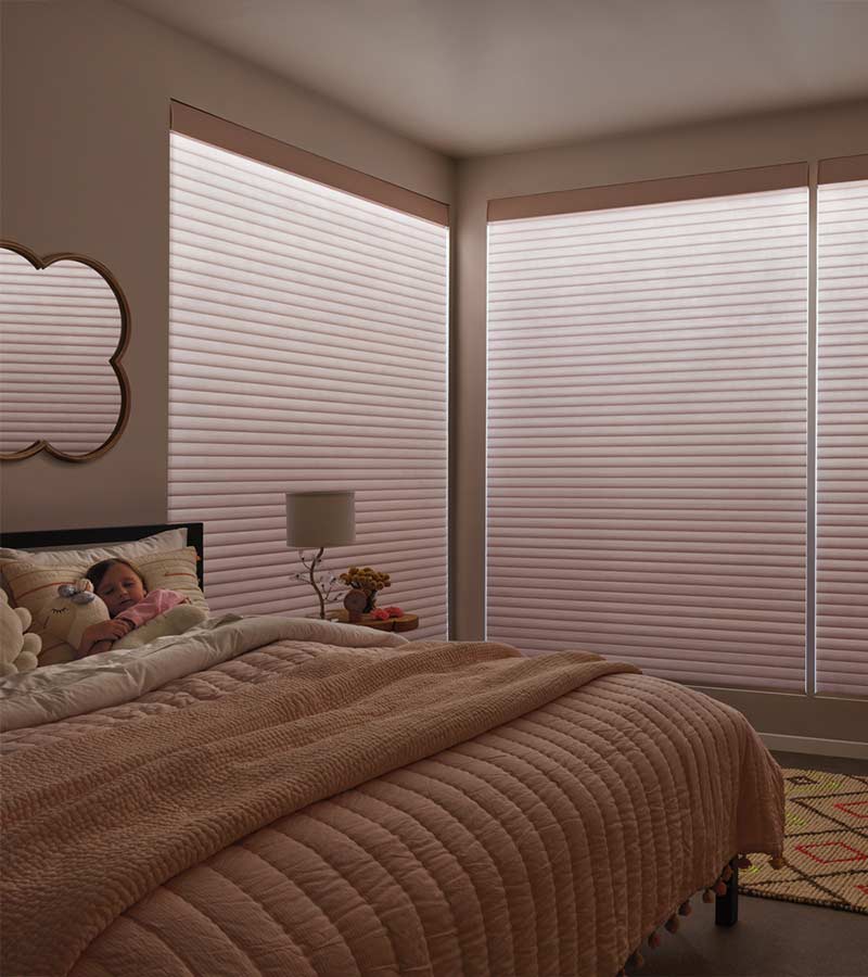 aura-illuminated-shades-sonnette-hunter-douglas-shades-creative-blinds bedroom with roller shades with aura illumination