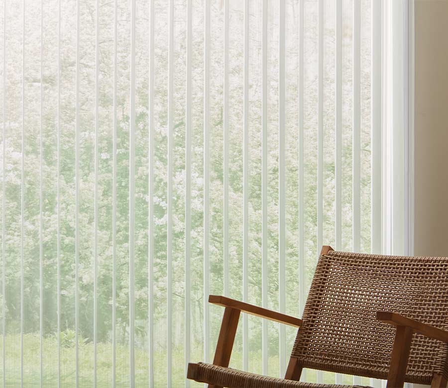 luminette-vertical-sheer-shades-french-door-shades-creative-blinds living room with vertical sheer shade with chair