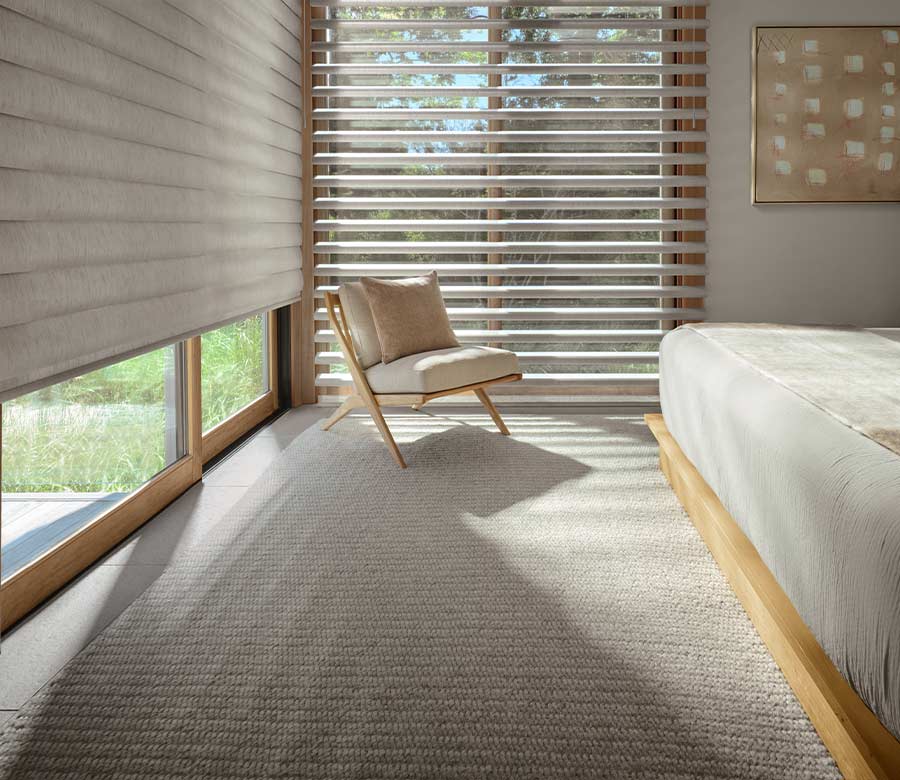 pirouette-primary-bedroom-window-treatments-hunter-douglas-creative-blinds master bedroom with beige pirouette shades with closed and open vanes