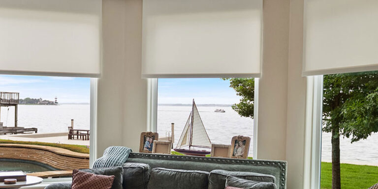 motorized designer roller shades throughout lake conroe home
