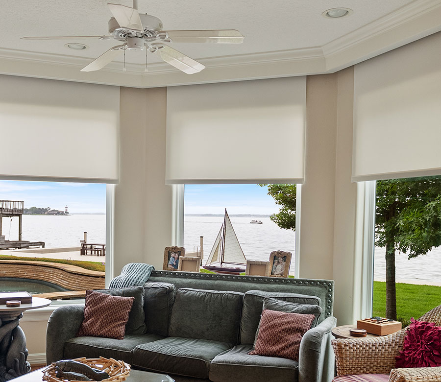 Hunter Douglas Designer Roller Shades in a Lake Conroe living room