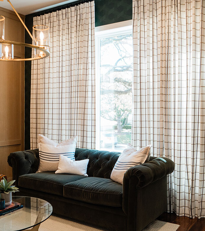 pinch pleat plaid custom drapery in a central Houston den